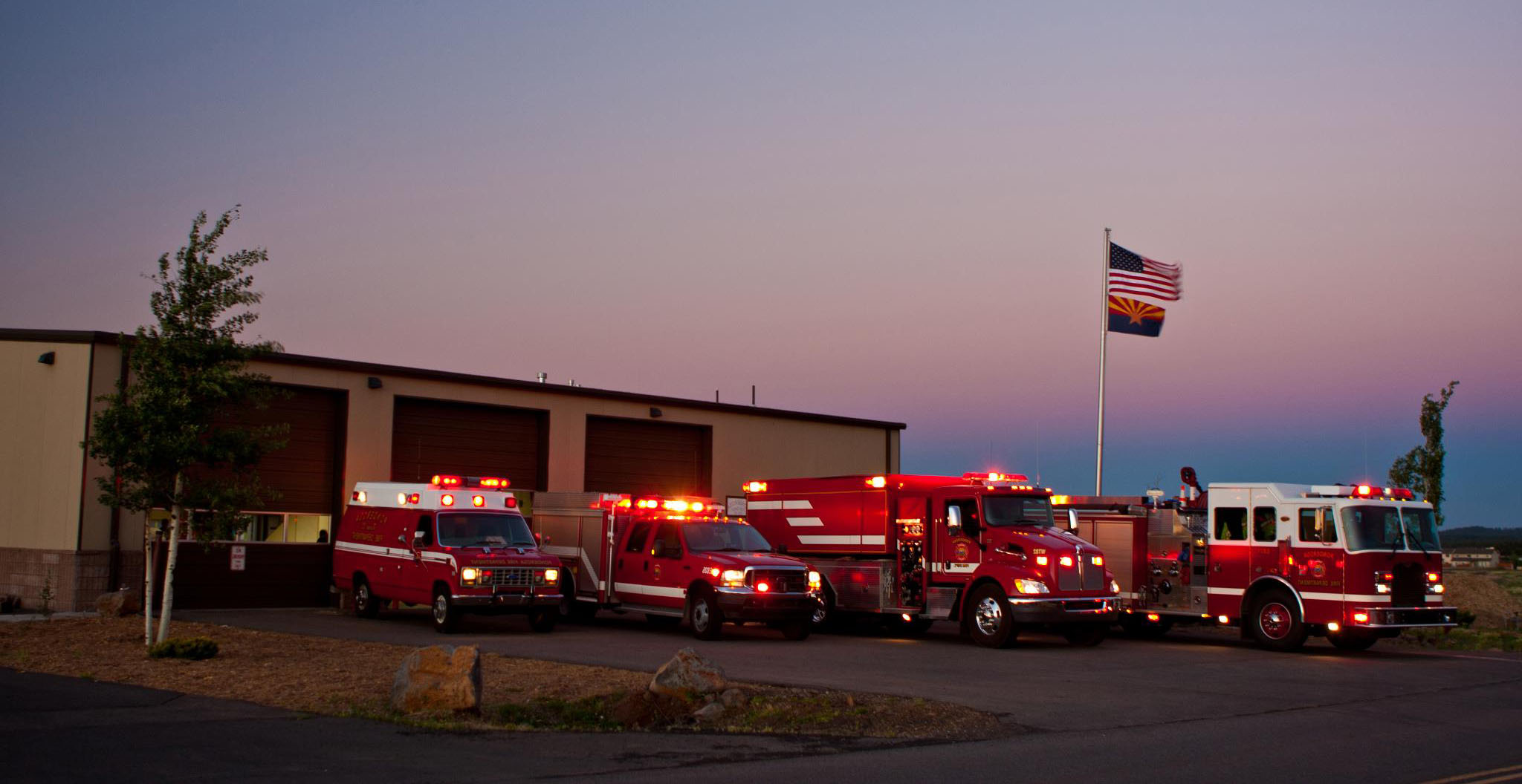 Flight of trucks outside station 82